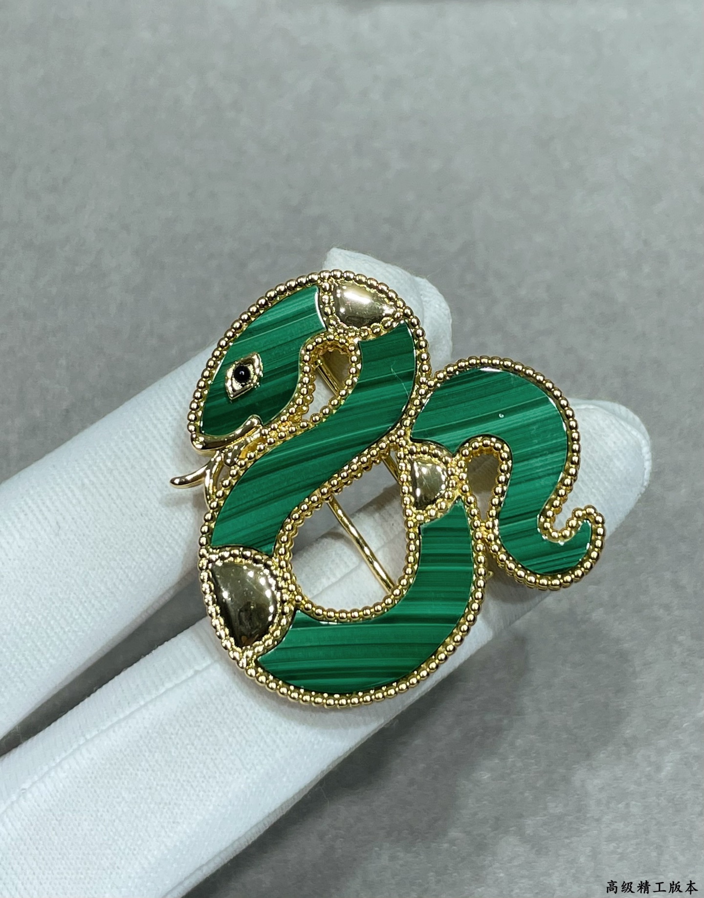 Van Cleef Arpels Lucky Animals Snake brooch yellow gold green malachite black onyx 30mm width