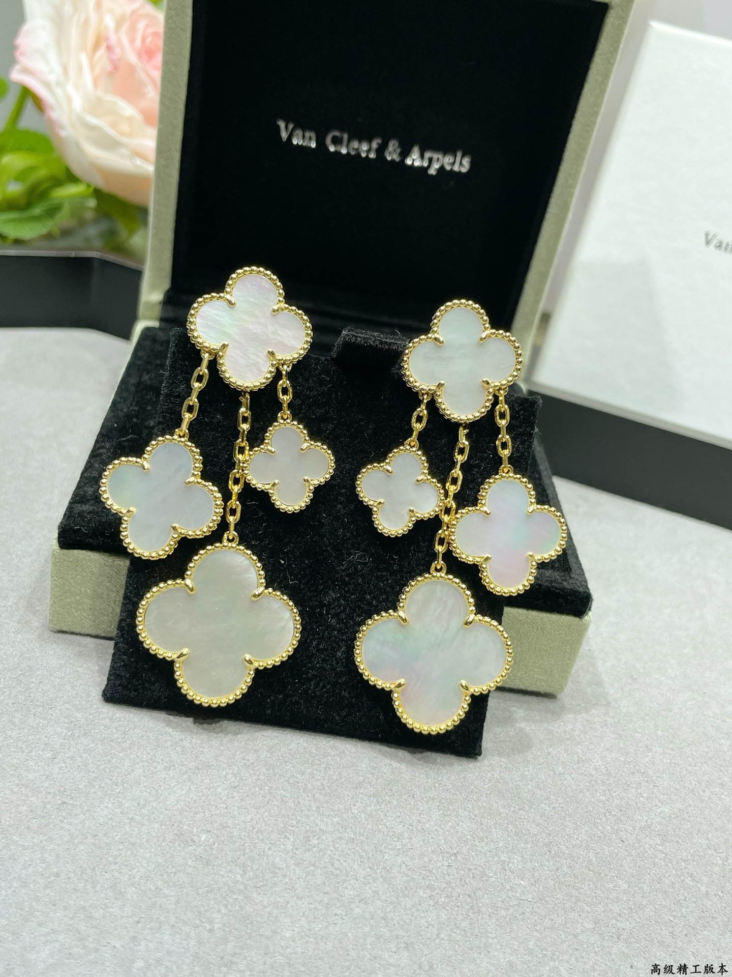 Van Cleef Arpels Magic Alhambra earrings Yellow gold white gold toned metal with white mother-of-pearl clover inlays 4 motifs per ear drop length approximately 6 5cm