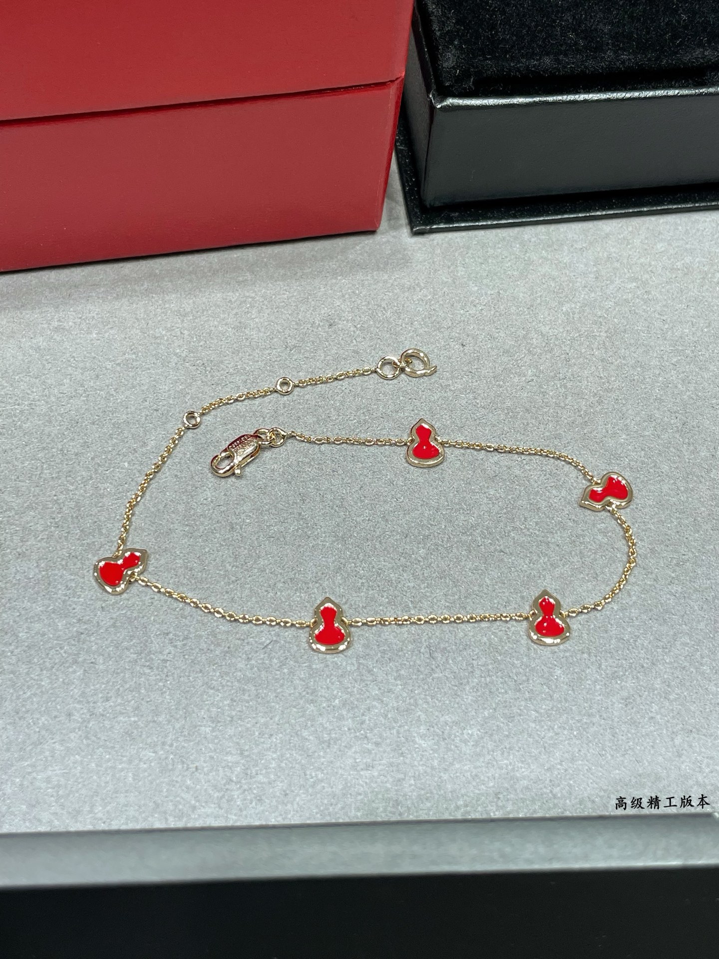 Qeelin Wulu bracelet 18K rose gold with red enamel variant with diamond-paved wulu charm 18cm