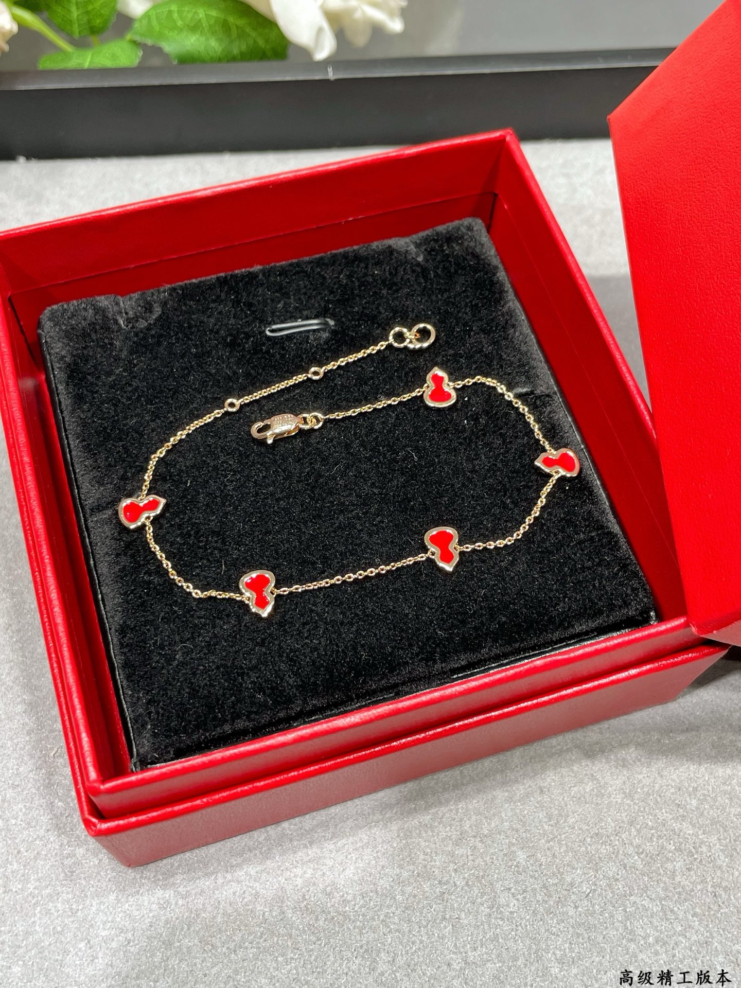 Qeelin Wulu bracelet 18K rose gold with red enamel variant with diamond-paved wulu charm 18cm
