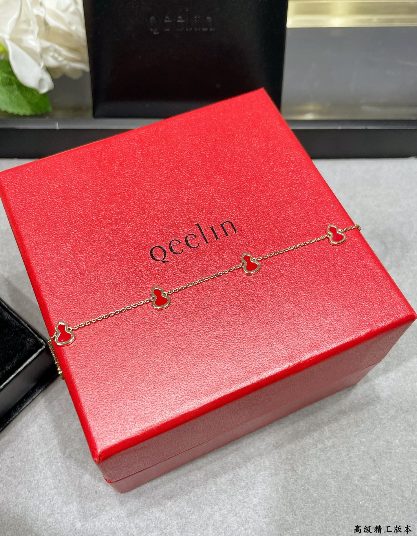 Qeelin Wulu bracelet 18K rose gold with red enamel variant with diamond-paved wulu charm 18cm