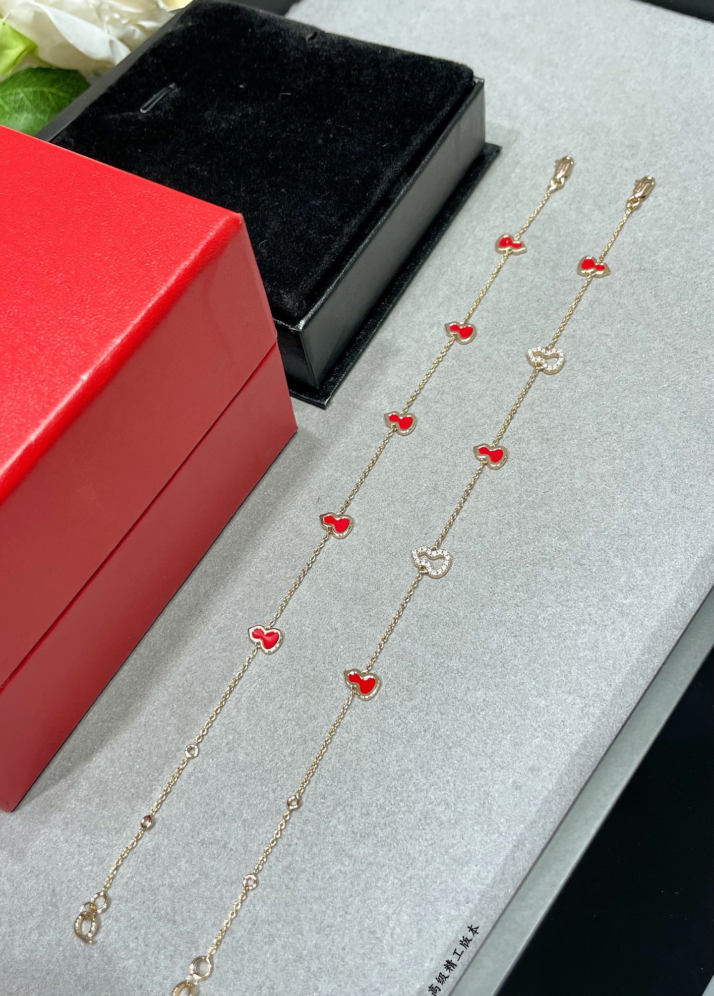 Qeelin Wulu bracelet 18K rose gold with red enamel variant with diamond-paved wulu charm 18cm