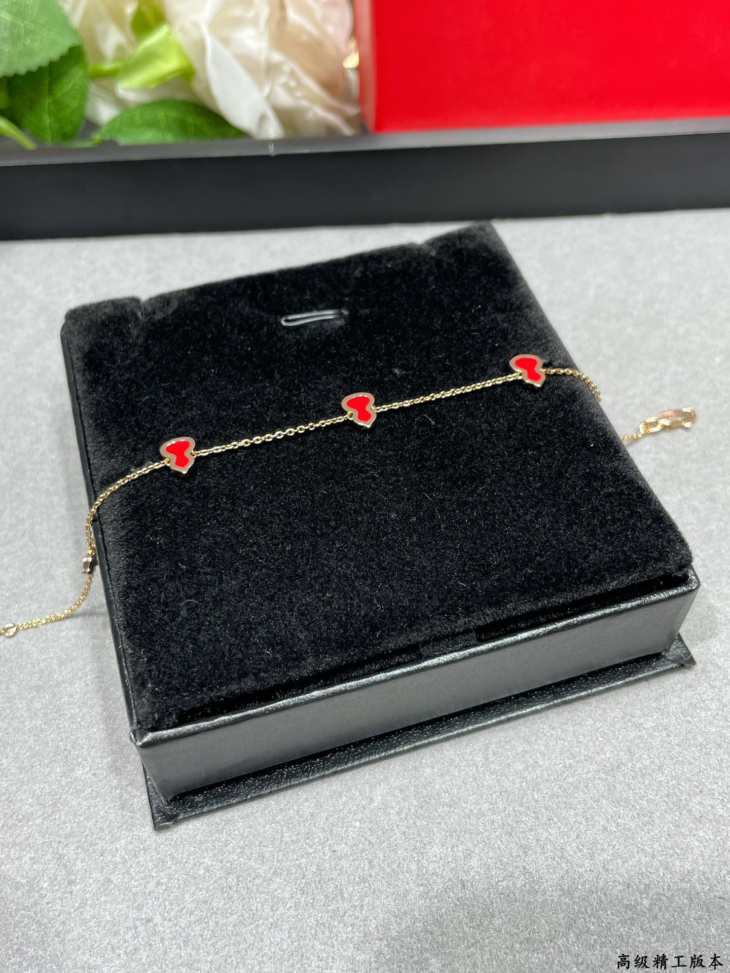 Qeelin Wulu bracelet 18K rose gold with red enamel variant with diamond-paved wulu charm 18cm