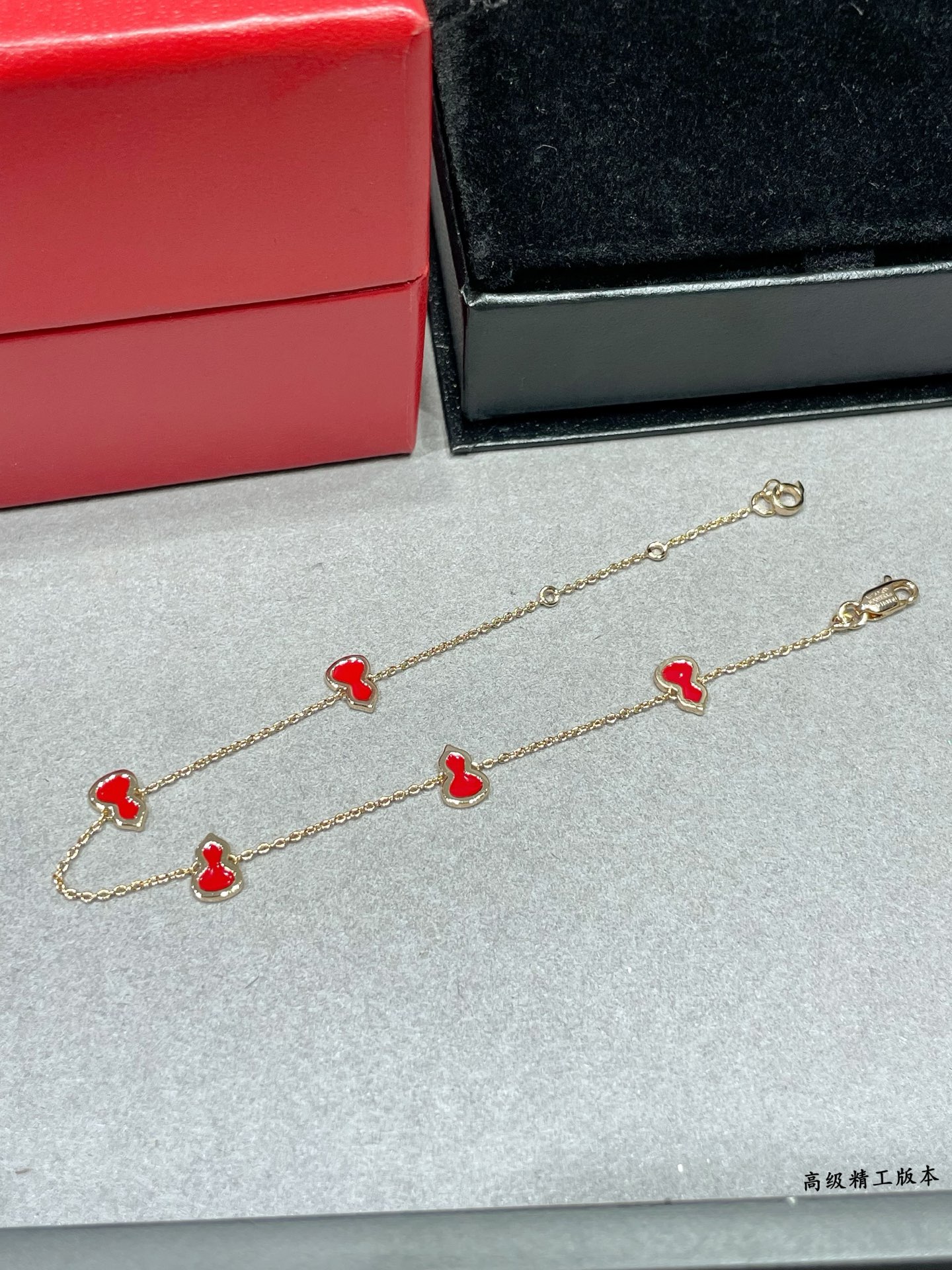 Qeelin Wulu bracelet 18K rose gold with red enamel variant with diamond-paved wulu charm 18cm