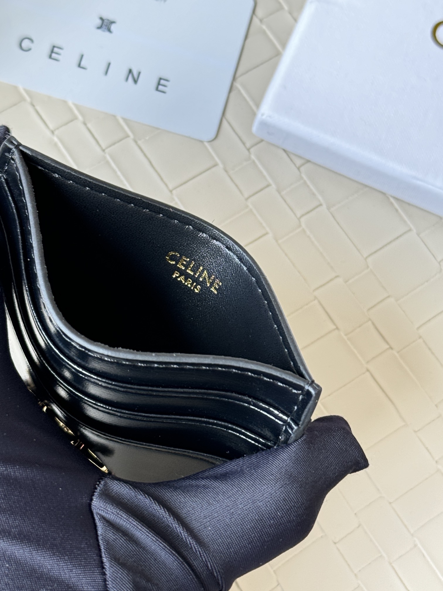 Celine Triomphe card holder black shiny calfskin with gold-tone metal hardware 10 5cm x 7