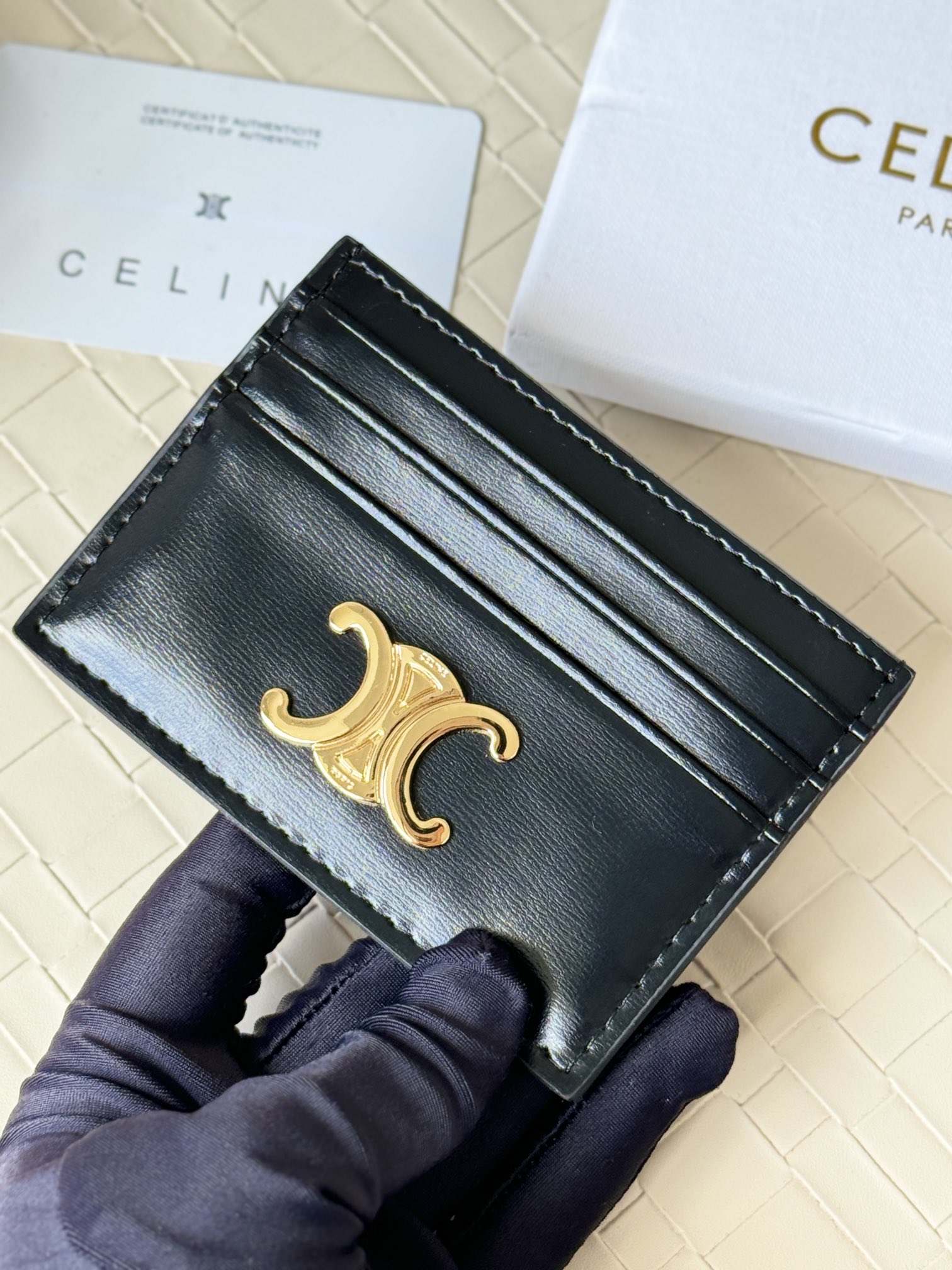 Celine Triomphe card holder black shiny calfskin with gold-tone metal hardware 10 5cm x 7