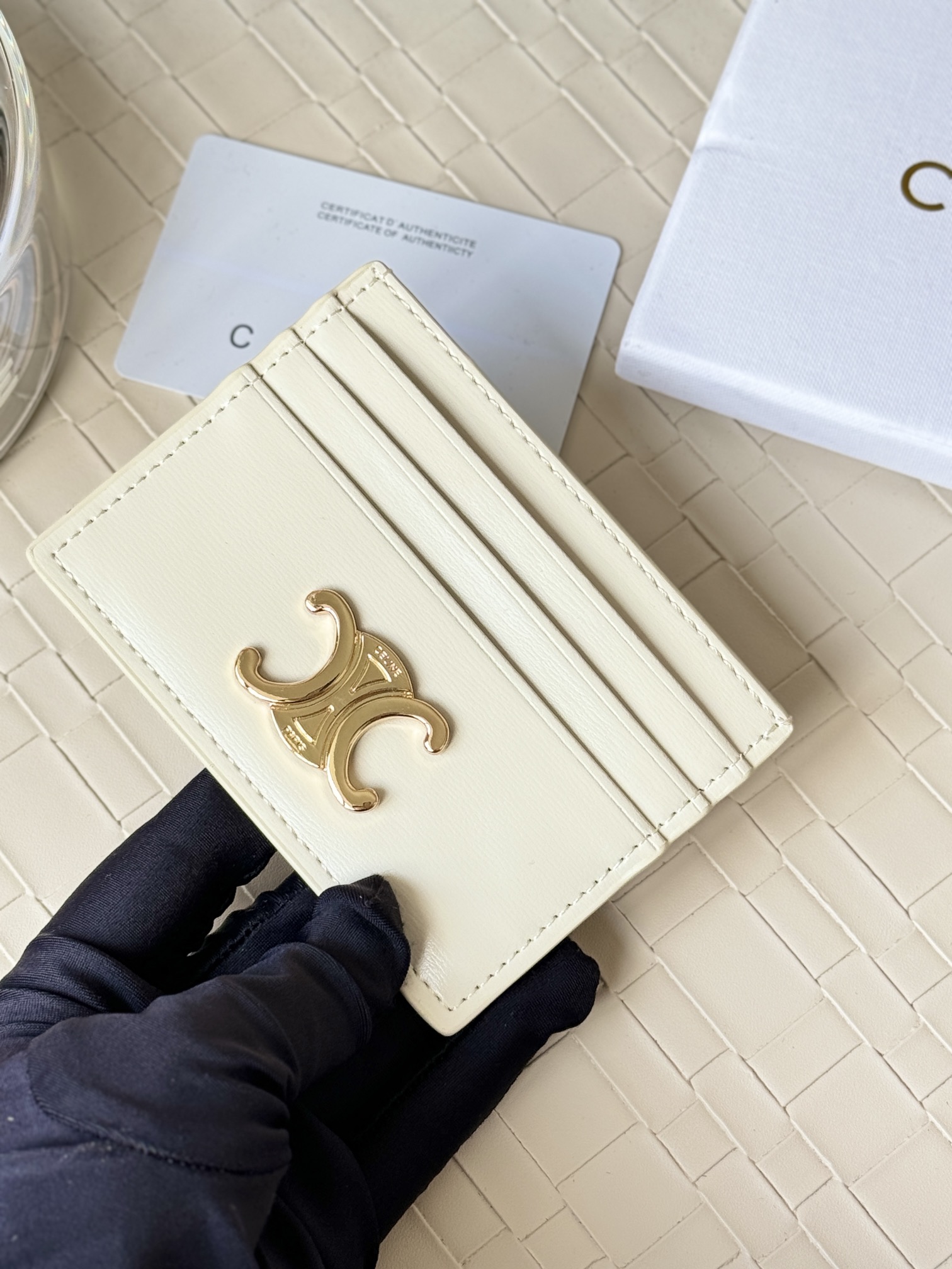 Celine Triomphe card holder off-white smooth leather gold-tone Triomphe metal logo 10 5cm x 7