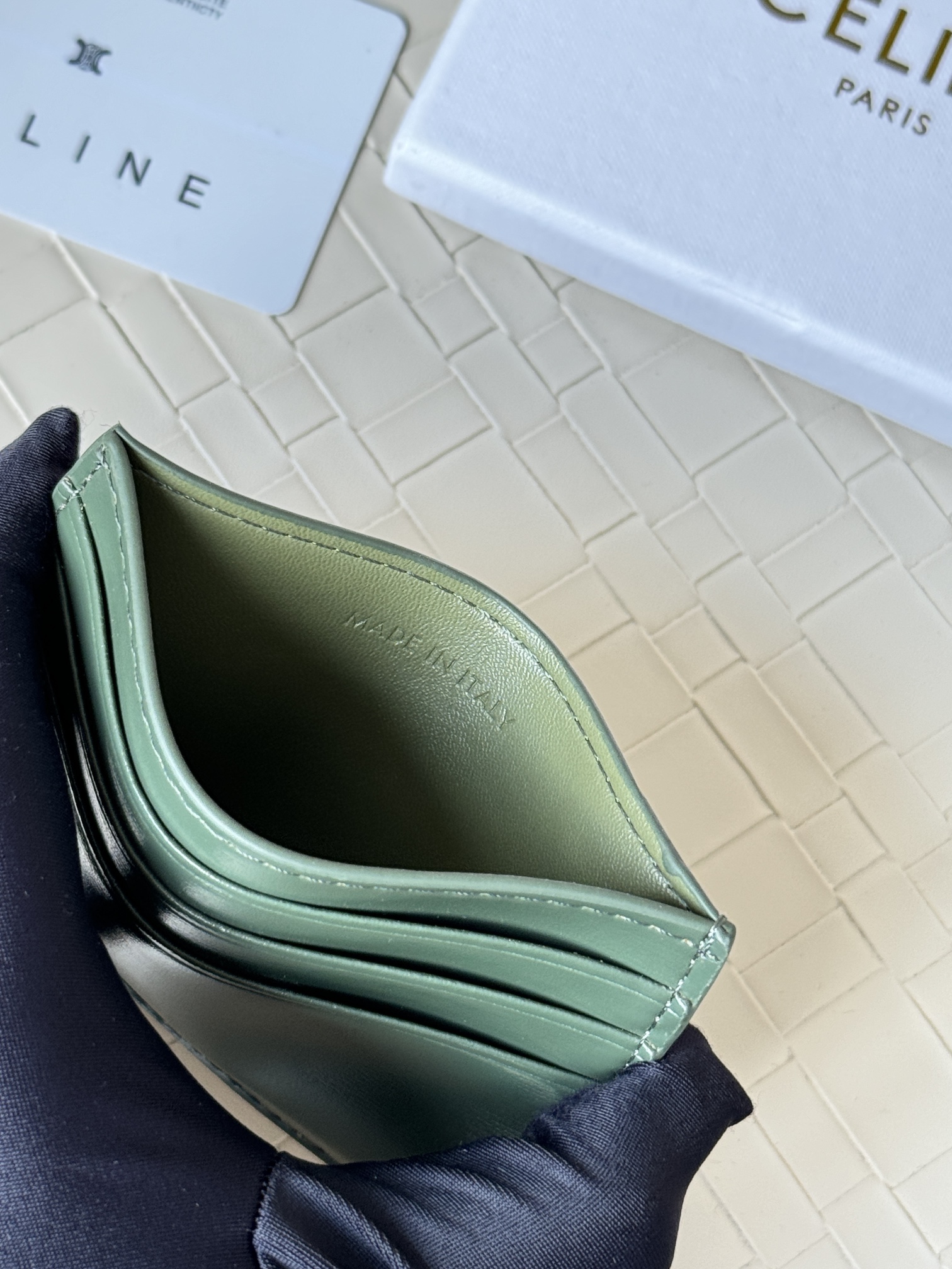Celine Triomphe card holder dark green smooth leather with gold-tone metal hardware 10 5cm x 7