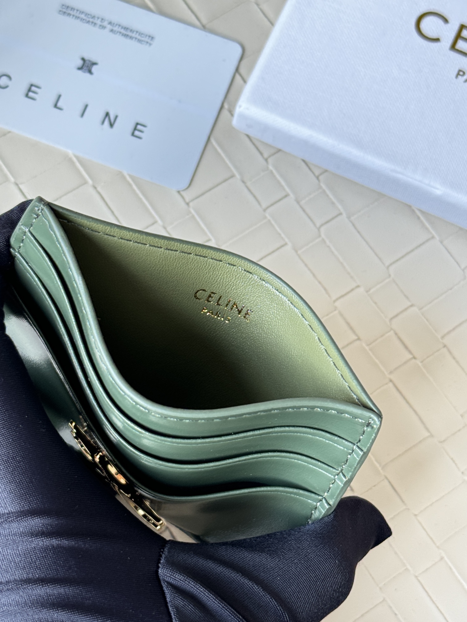 Celine Triomphe card holder dark green smooth leather with gold-tone metal hardware 10 5cm x 7