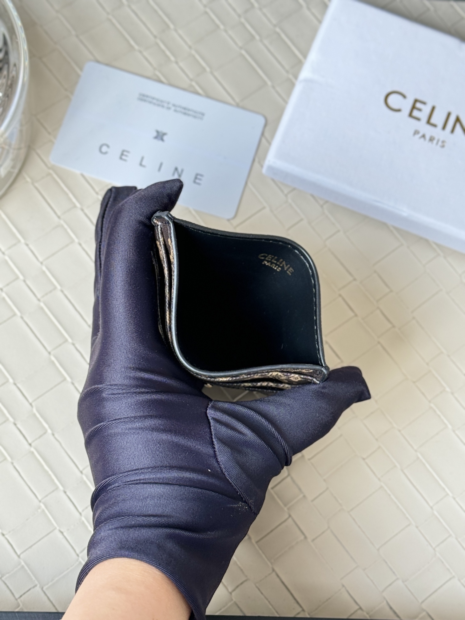 Celine Triomphe card holder dark brown coated canvas with tan Triomphe monogram gold-tone metal hardware black leather trim 10cm x 7 5cm