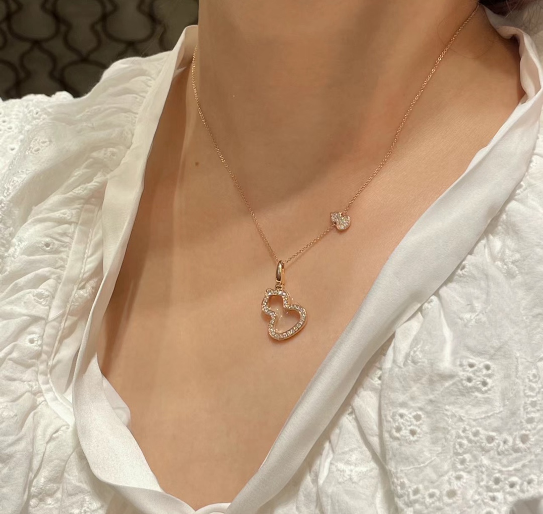 Qeelin Wulu necklace Available in rose gold platinum and yellow gold all set with clear pave diamonds 42cm