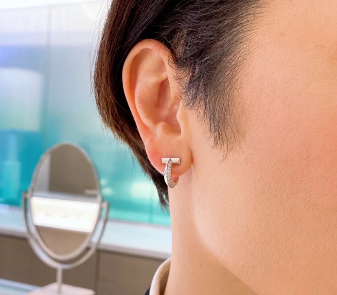 Tiffany T1 earrings silver-toned metal with clear diamond accents 12mm hoop diameter