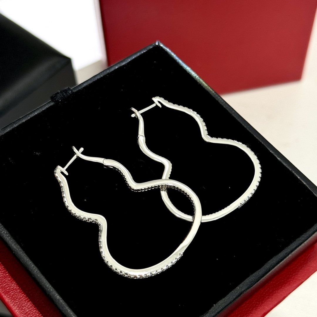 Qeelin Wulu earrings silver-toned metal with clear pave stones 4cm hoop length
