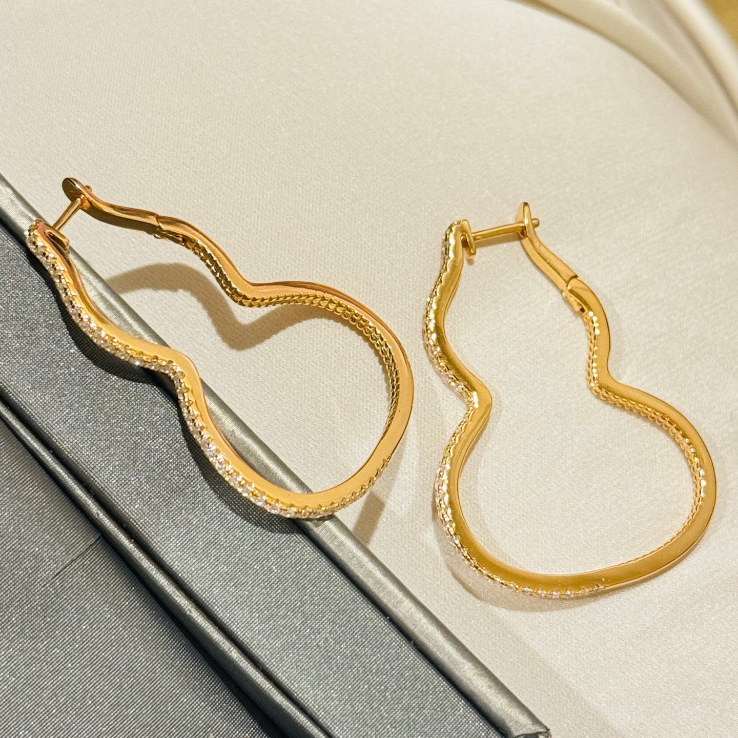 Qeelin Wulu earrings rose gold metal with clear diamond pave 3 5cm hoop diameter