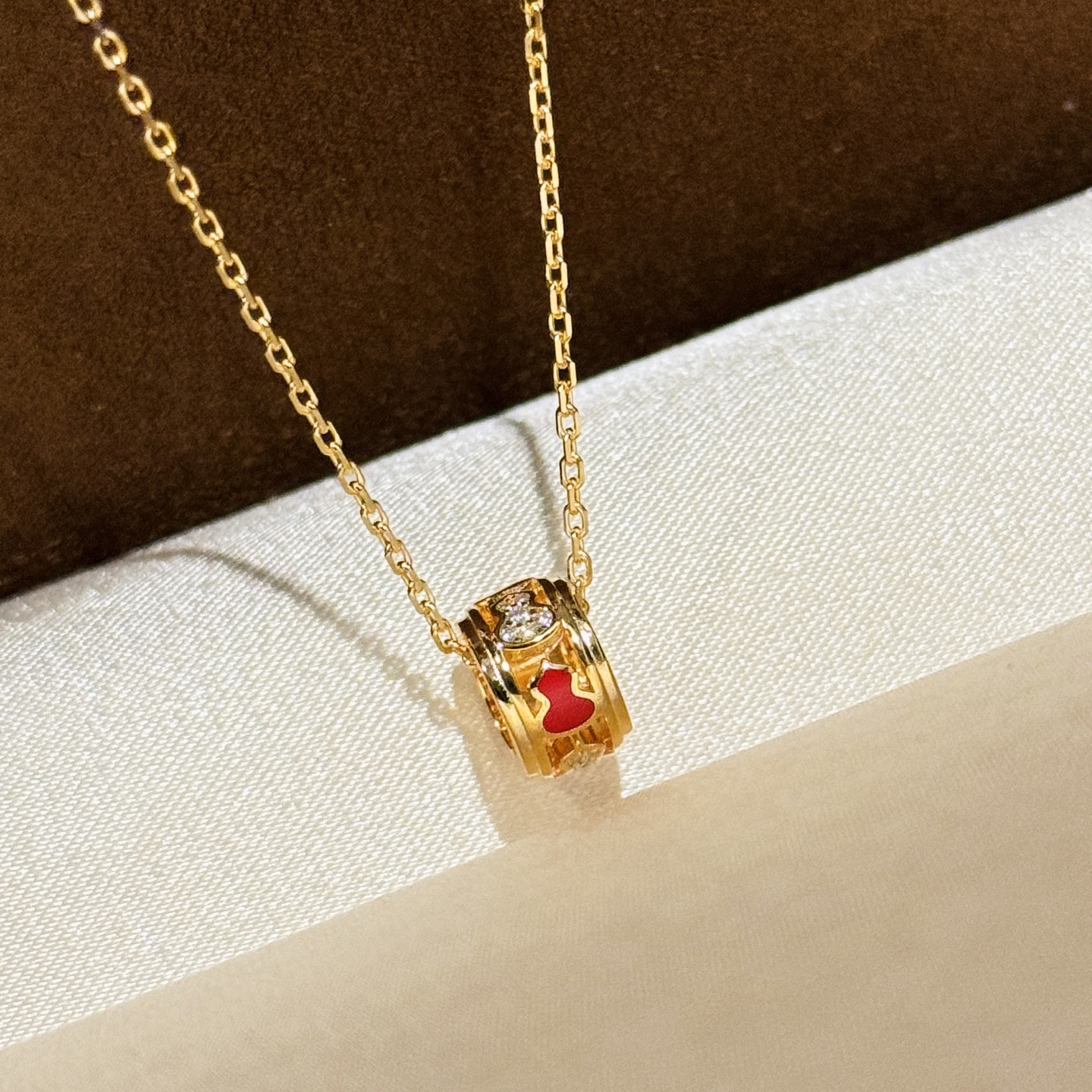 Qeelin Wulu necklace Yellow gold plated metal with red agate and clear diamond accents 40-45cm adjustable