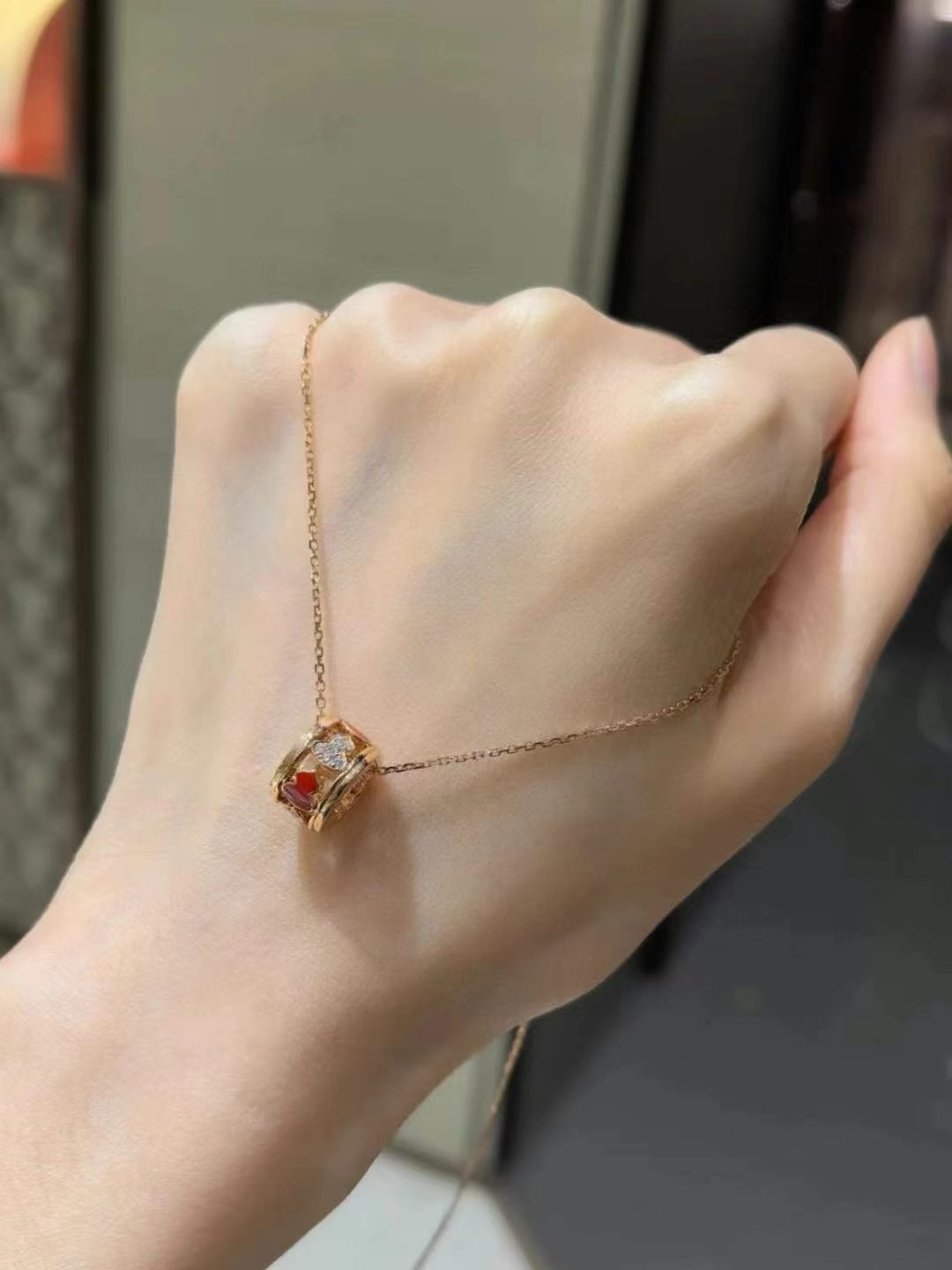 Qeelin Wulu necklace Yellow gold plated metal with red agate and clear diamond accents 40-45cm adjustable