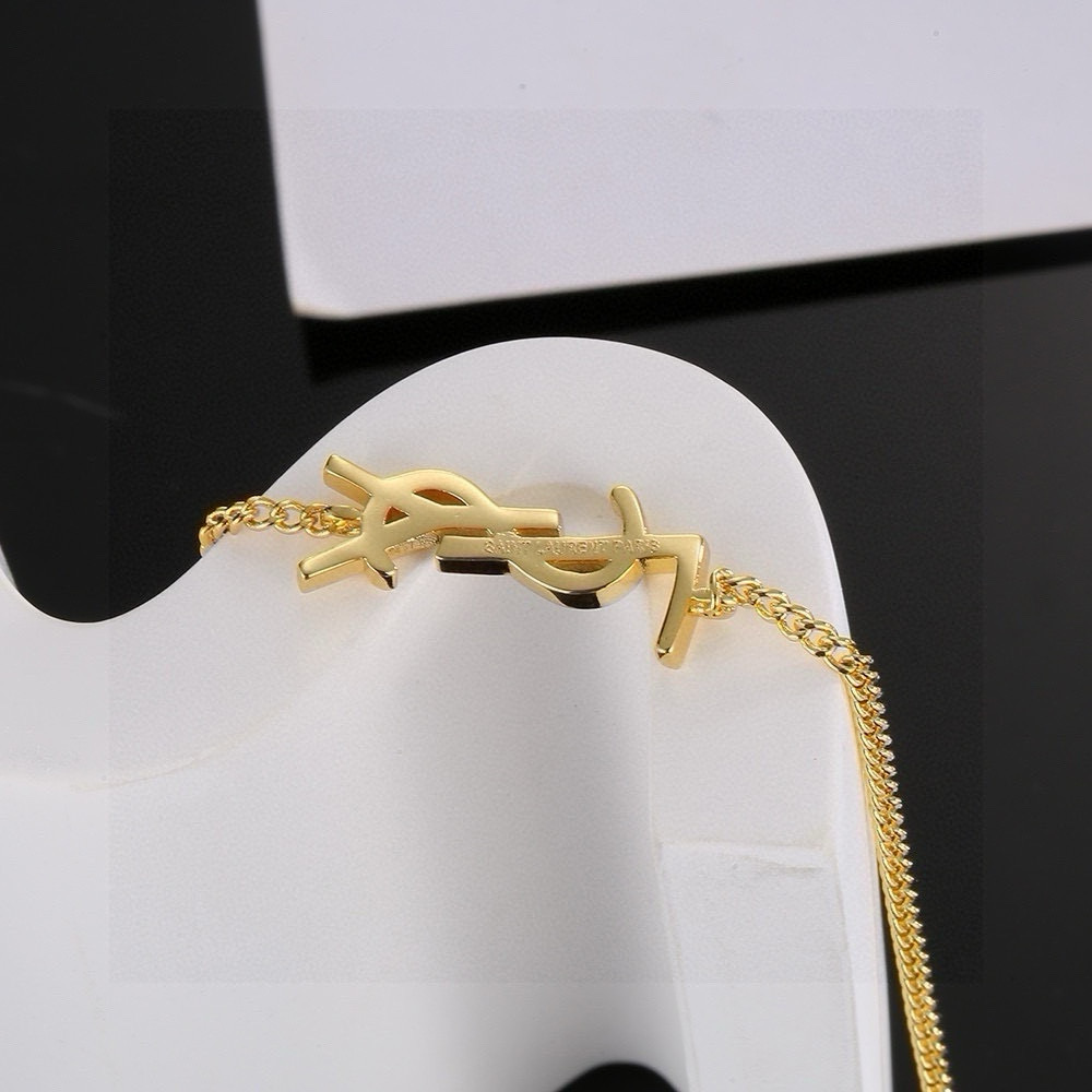 Saint Laurent Cassandre YSL Monogram Chain Bracelet bracelet Gold-tone metal also available in silver-tone metal no gemstones 18cm with 3cm extender