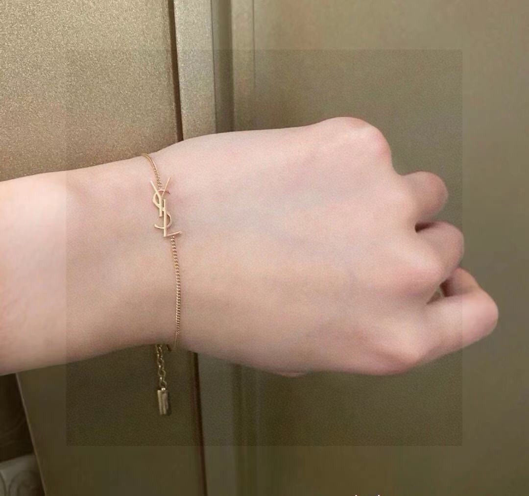 Saint Laurent Cassandre YSL Monogram Chain Bracelet bracelet Gold-tone metal also available in silver-tone metal no gemstones 18cm with 3cm extender