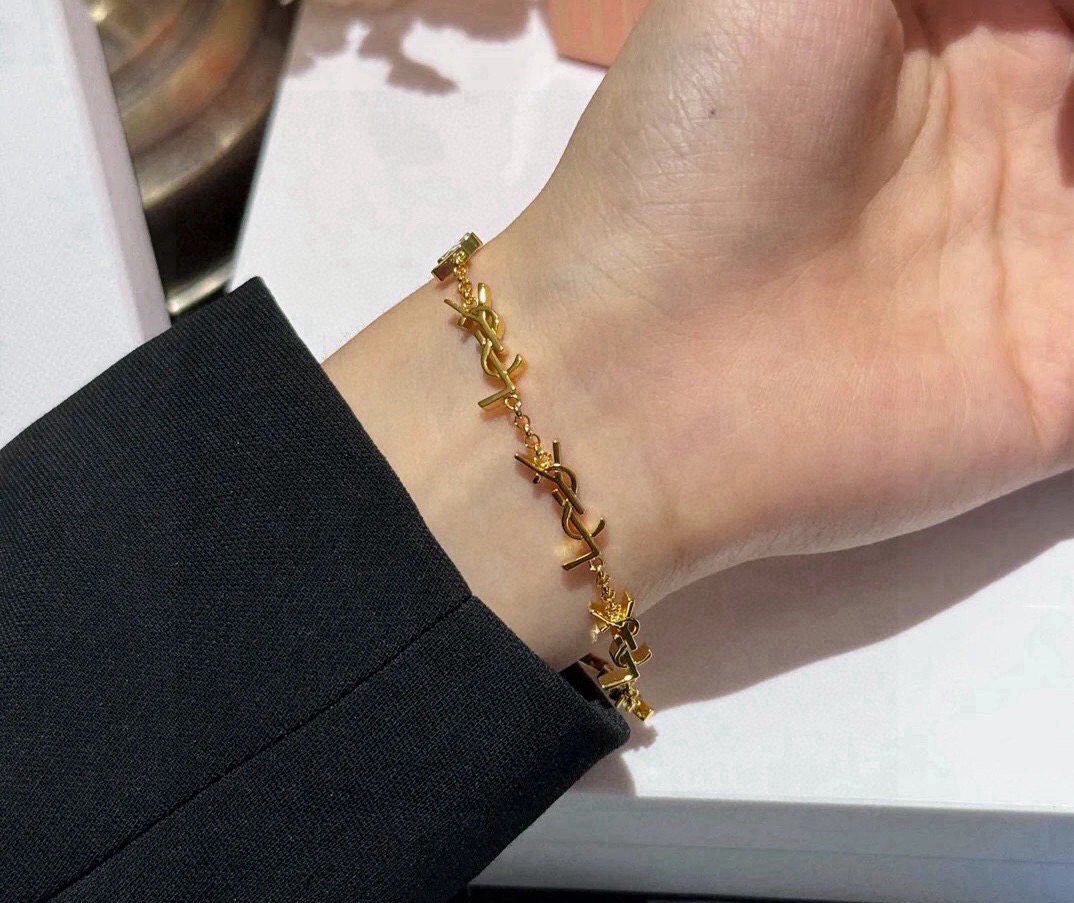Saint Laurent Cassandre Multi Monogram Chain bracelet gold-tone metal 18cm with 5cm extender