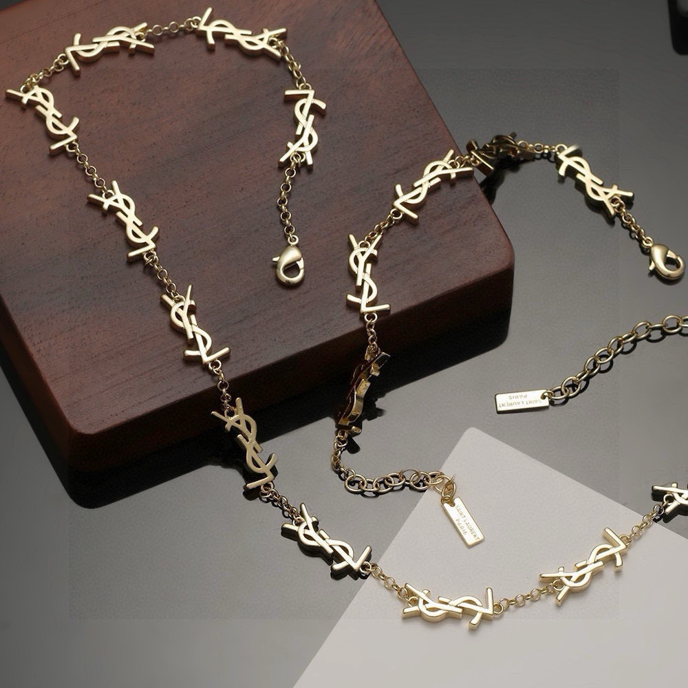 Saint Laurent Cassandre Multi Monogram Chain bracelet gold-tone metal 18cm with 5cm extender