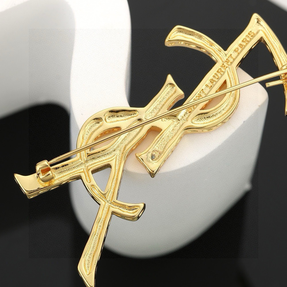 Saint Laurent Cassandre YSL Monogram Bamboo Brooch brooch gold-tone metal no accent stones 4 5cm width