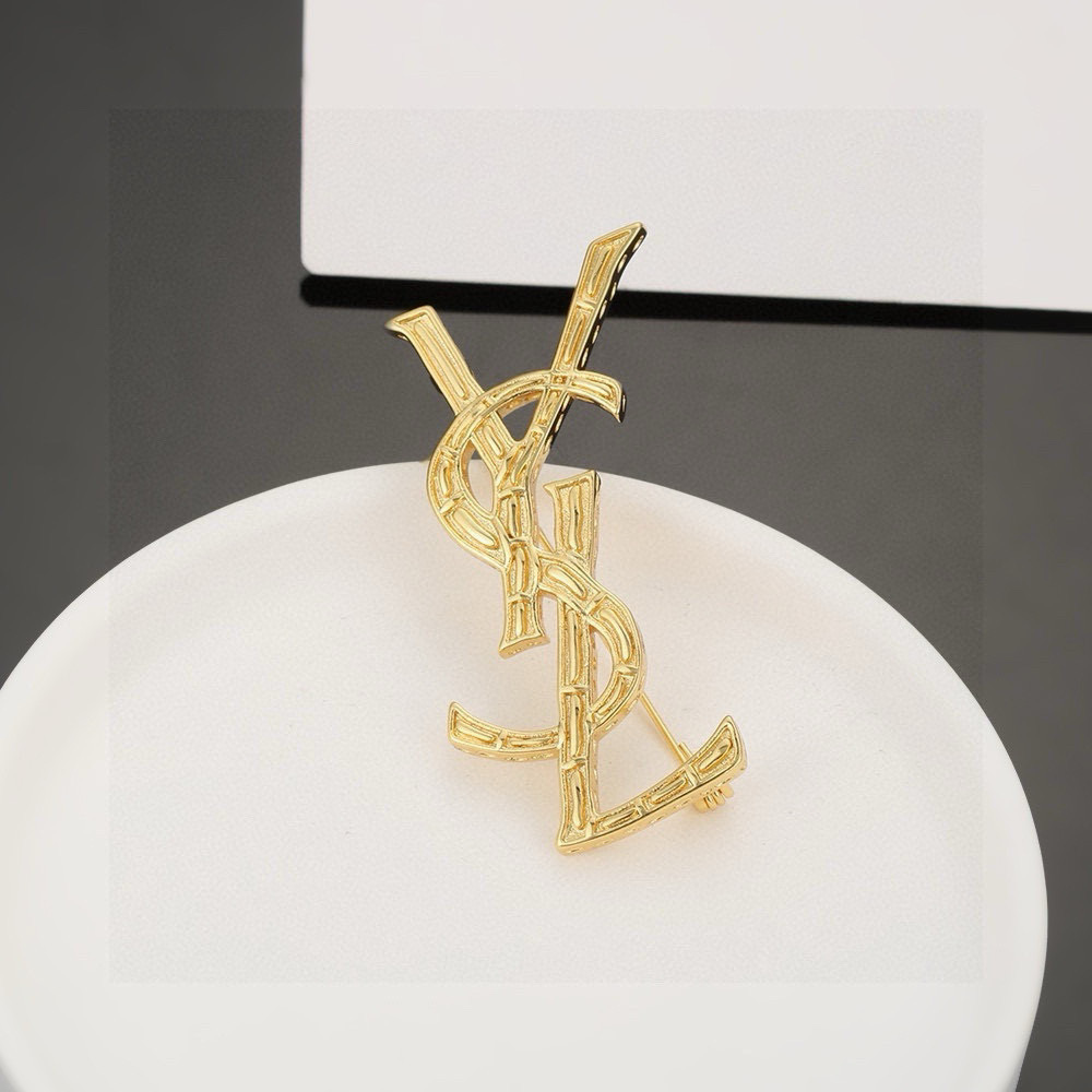 Saint Laurent Cassandre YSL Monogram Bamboo Brooch brooch gold-tone metal no accent stones 4 5cm width