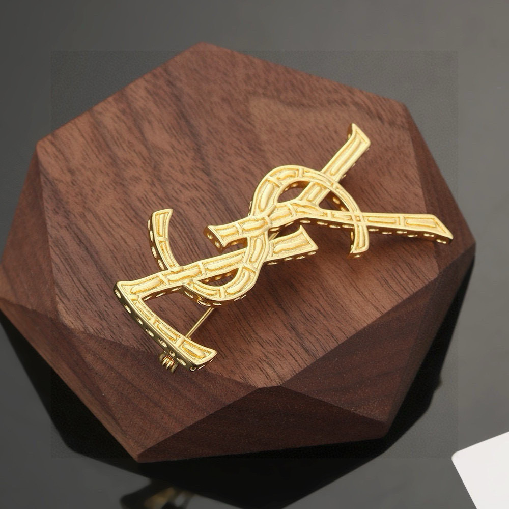 Saint Laurent Cassandre YSL Monogram Bamboo Brooch brooch gold-tone metal no accent stones 4 5cm width