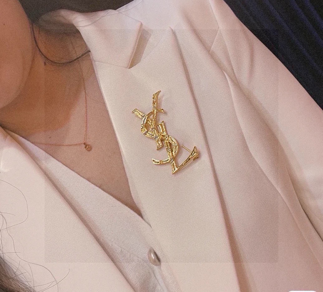 Saint Laurent Cassandre YSL Monogram Bamboo Brooch brooch gold-tone metal no accent stones 4 5cm width