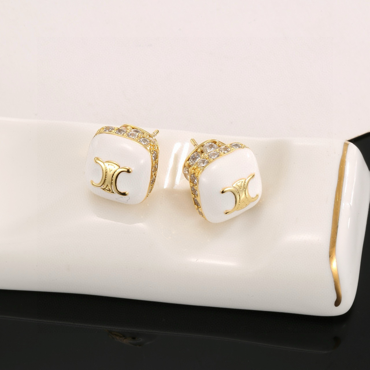 Celine Triomphe earrings gold-tone metal white enamel clear crystal 1 2cm