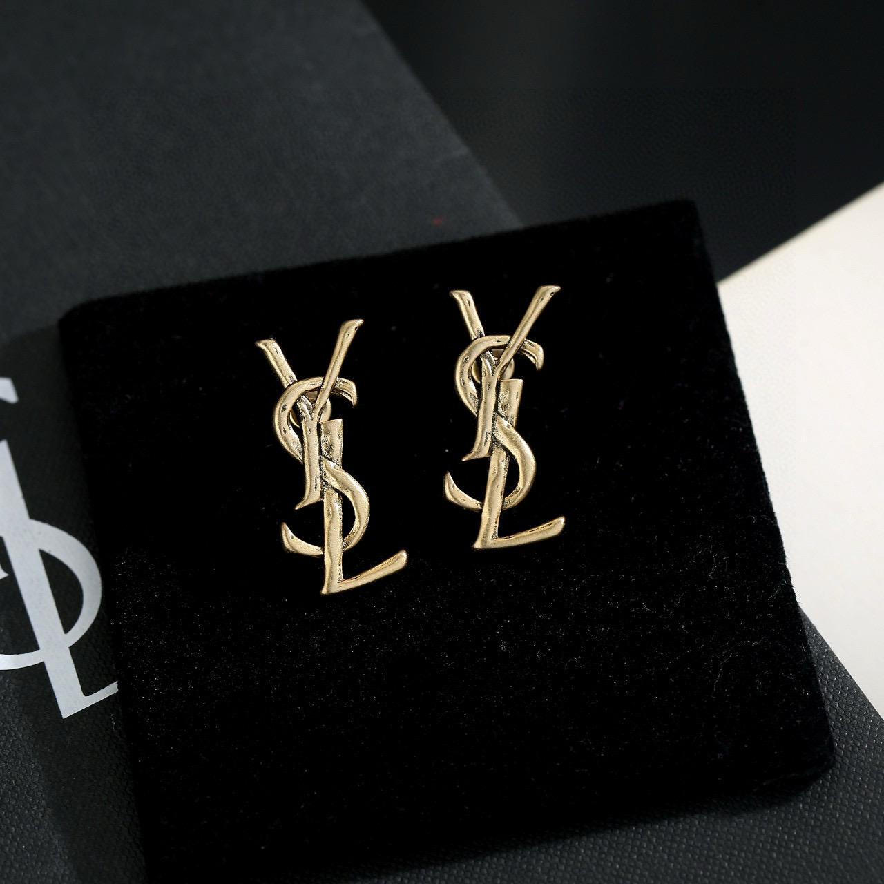 Saint Laurent Cassandre Monogram earrings antique gold metal 2cm length
