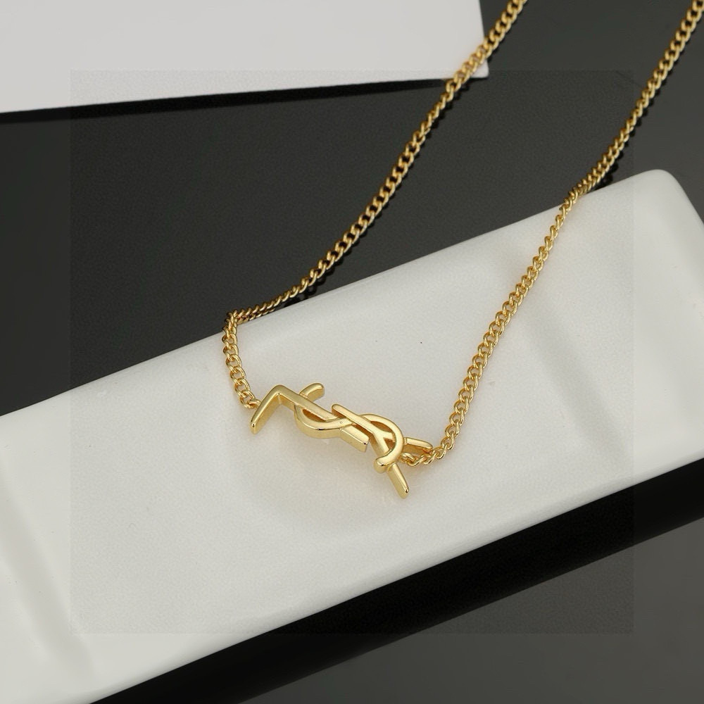 Saint Laurent Cassandre YSL Monogram necklace gold-tone metal no accent stones 45cm with 5cm extender