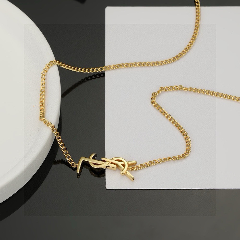Saint Laurent Cassandre YSL Monogram necklace gold-tone metal no accent stones 45cm with 5cm extender
