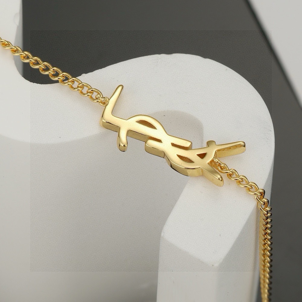 Saint Laurent Cassandre YSL Monogram necklace gold-tone metal no accent stones 45cm with 5cm extender