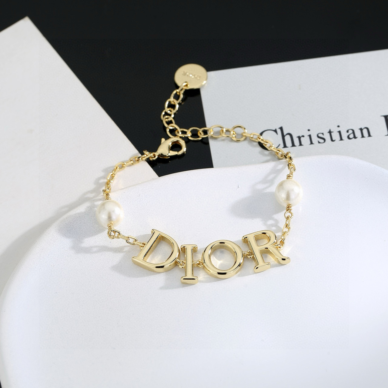 Dior Dior Tribales DIOR Letter Bracelet bracelet gold-tone metal with white resin pearls 18cm with 3cm extension chain