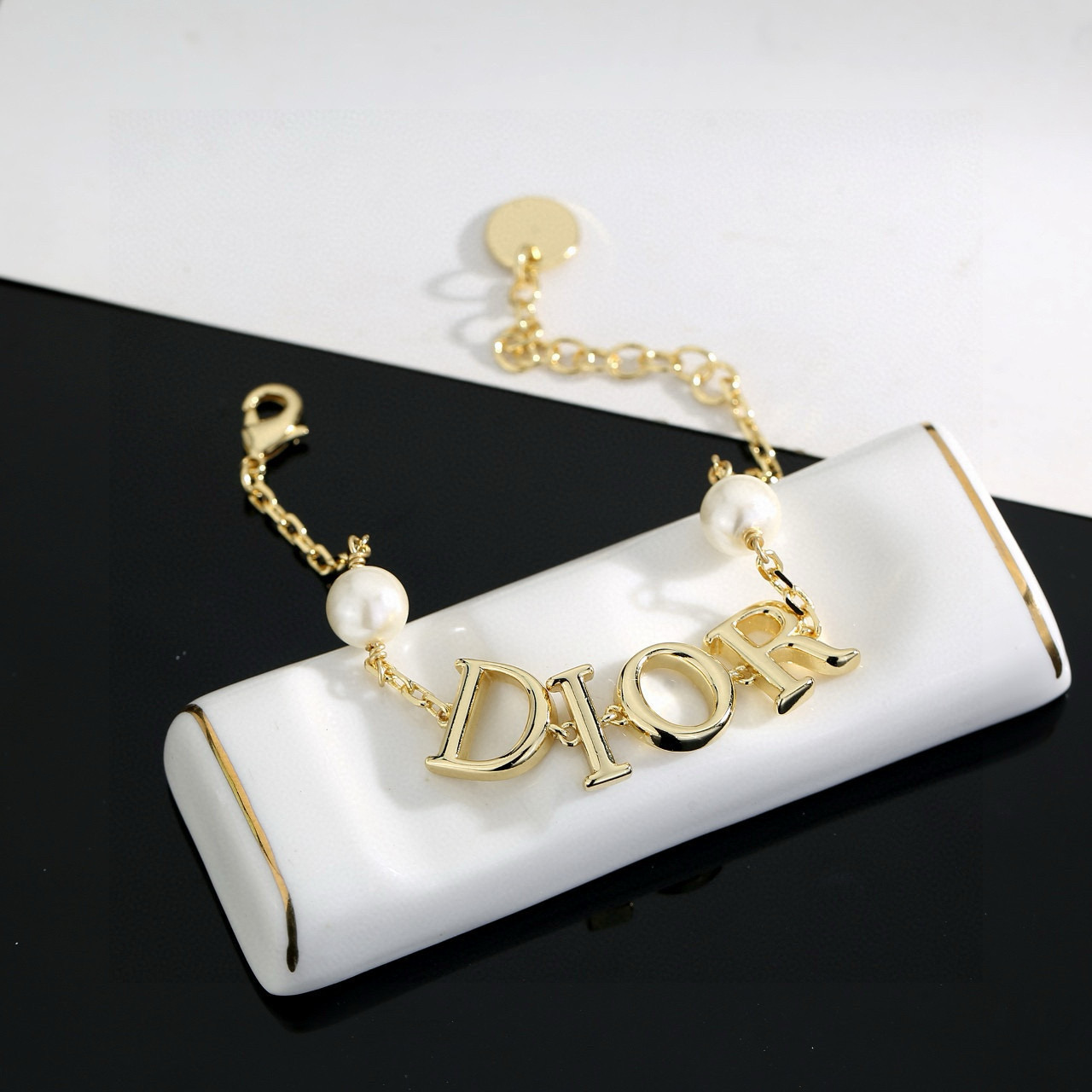 Dior Dior Tribales DIOR Letter Bracelet bracelet gold-tone metal with white resin pearls 18cm with 3cm extension chain