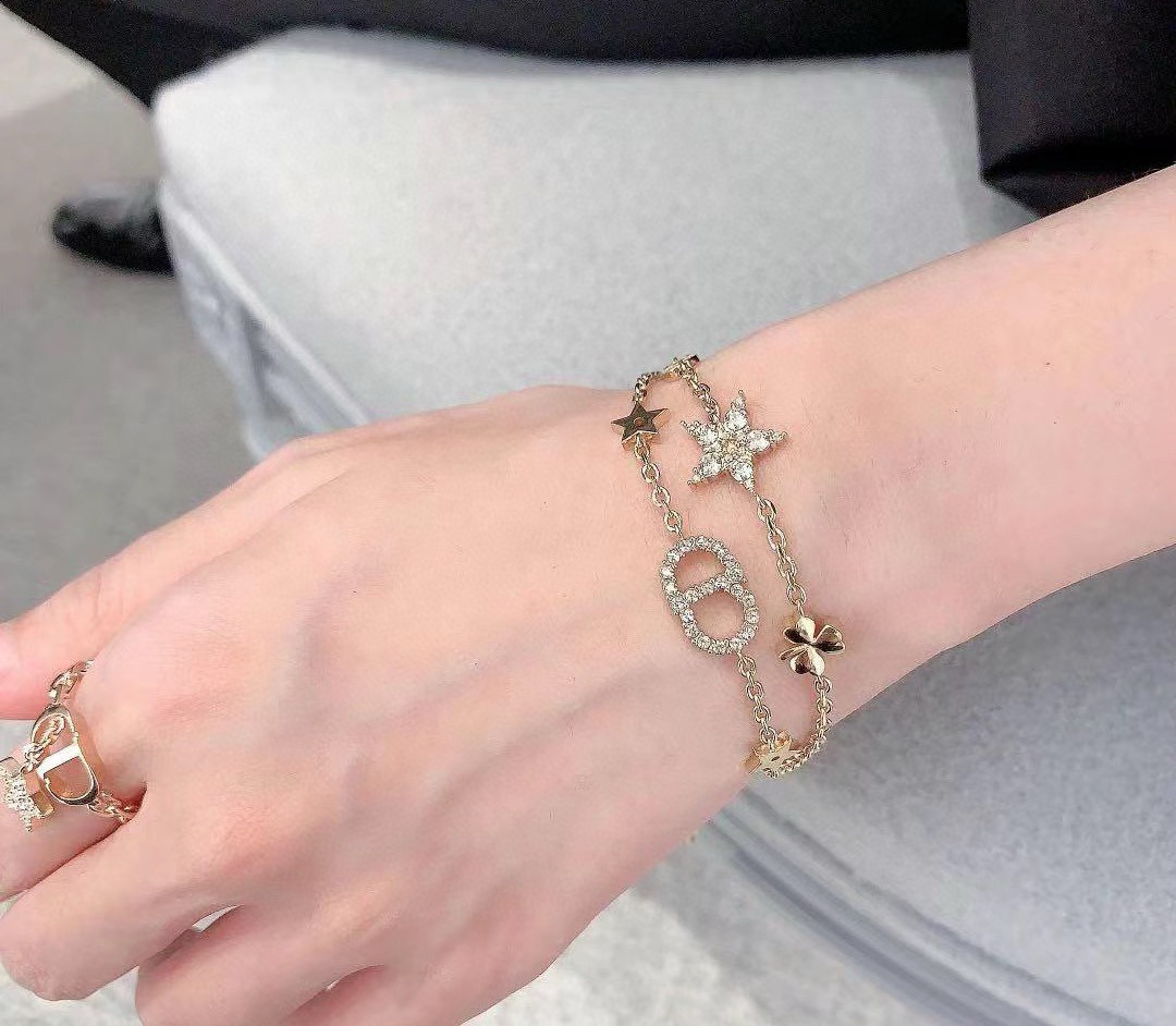 Dior J ADIOR Lucky Charms bracelet gold-tone metal with clear crystal accents 16cm with 3cm extender