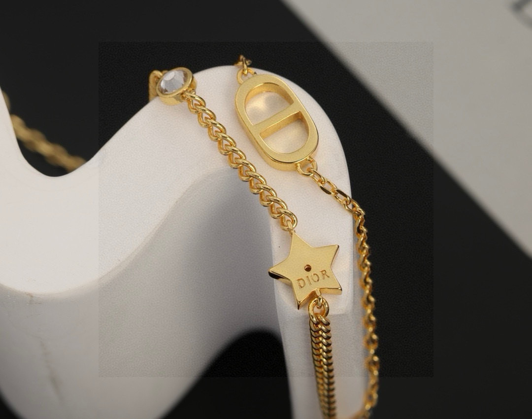 Dior Petit CD Star Double Chain bracelet gold-tone metal with clear crystal accents 16cm with 3cm extender