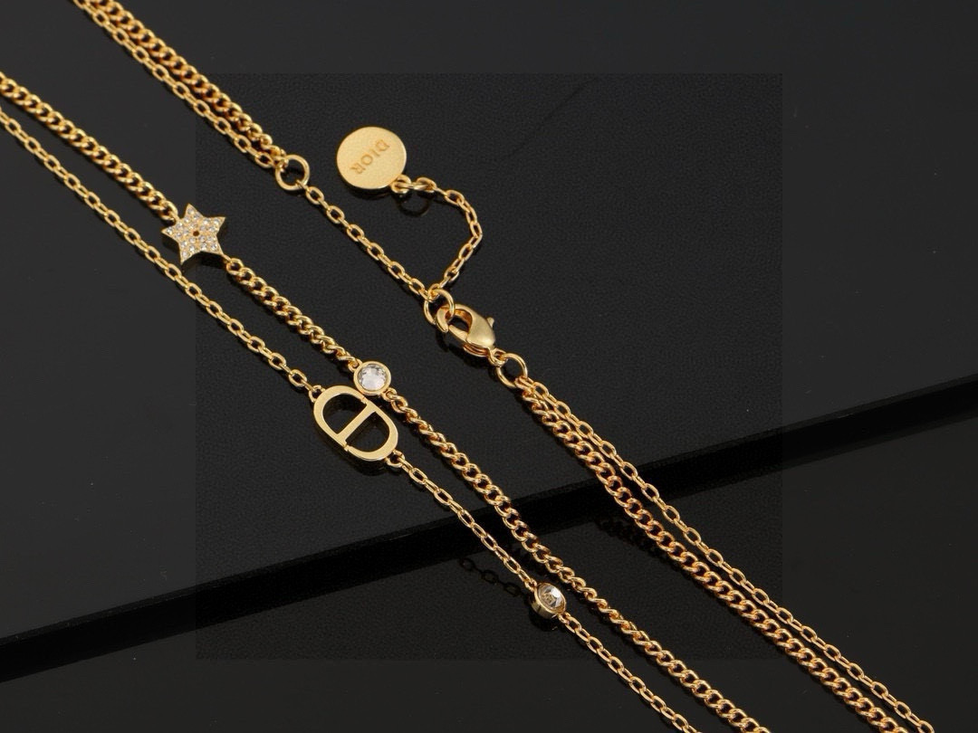Dior Petit CD Star Double Chain bracelet gold-tone metal with clear crystal accents 16cm with 3cm extender
