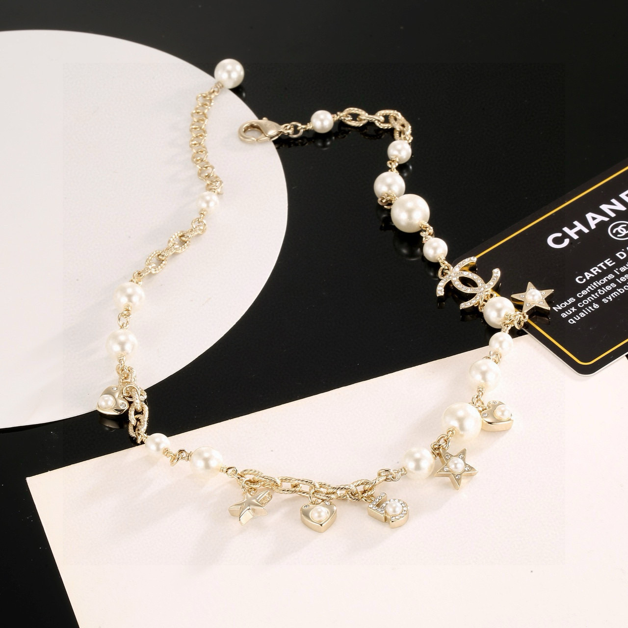 Chanel CC Charm Pearl Star Heart Necklace necklace Gold-tone metal cream white faux pearls clear crystal accents 42cm with 5cm extender