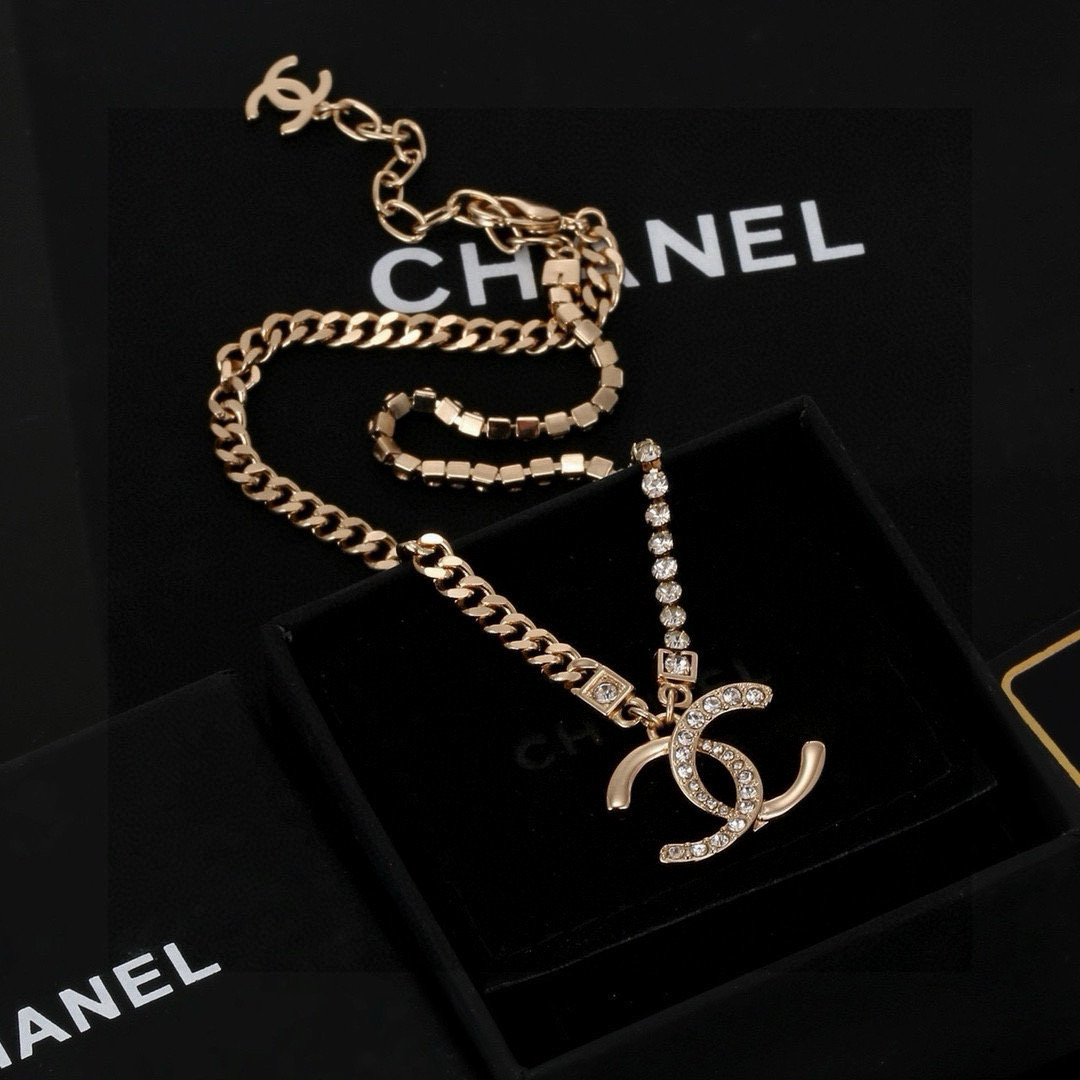 Chanel CC Logo Crystal Pendant necklace Gold-tone metal with clear crystal accents 42cm