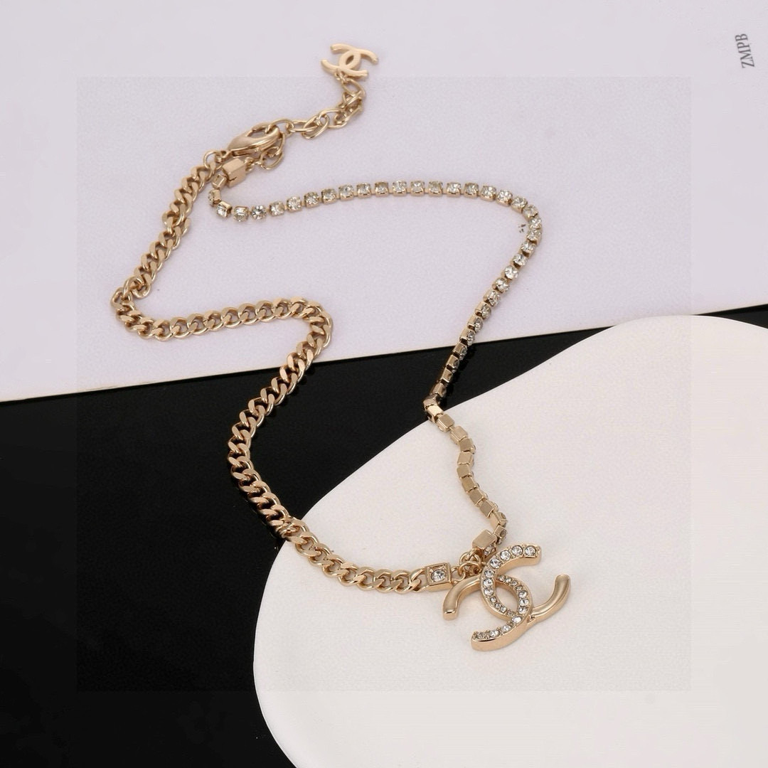 Chanel CC Logo Crystal Pendant necklace Gold-tone metal with clear crystal accents 42cm