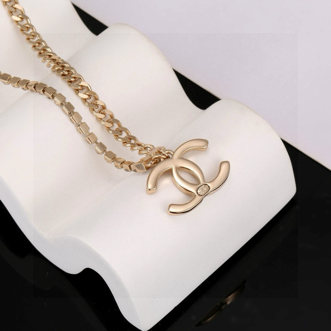 Chanel CC Logo Crystal Pendant necklace Gold-tone metal with clear crystal accents 42cm