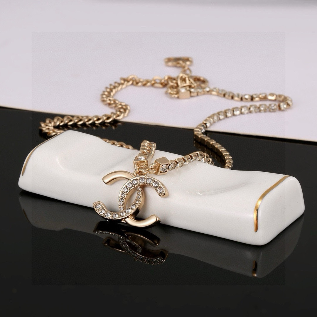 Chanel CC Logo Crystal Pendant necklace Gold-tone metal with clear crystal accents 42cm