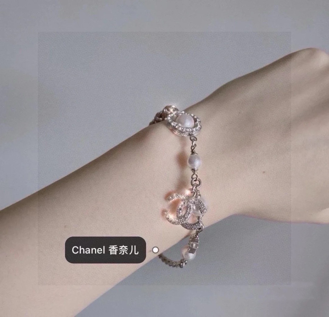 Chanel CC Logo Pearl Star Clover Charm Bracelet bracelet Silver-toned metal white faux pearls clear crystal rhinestones 18cm with 3cm extender
