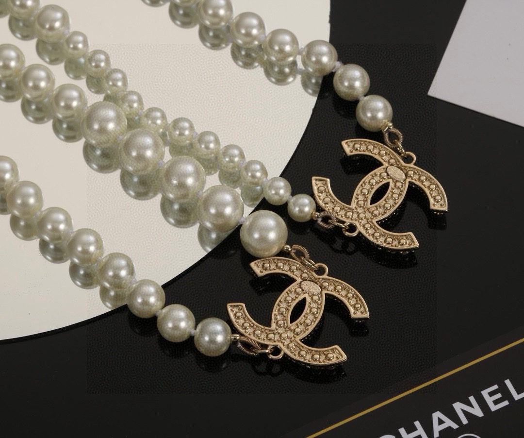 Chanel CC Logo Multi-Charm Pearl Long Necklace necklace Gold-tone metal cream white faux pearl clear crystal 80cm with 5cm extension chain