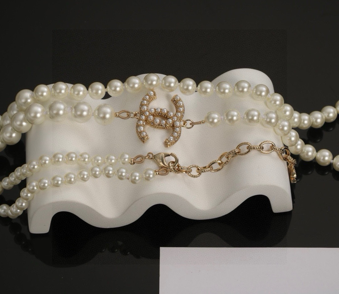 Chanel CC Logo Multi-Charm Pearl Long Necklace necklace Gold-tone metal cream white faux pearl clear crystal 80cm with 5cm extension chain