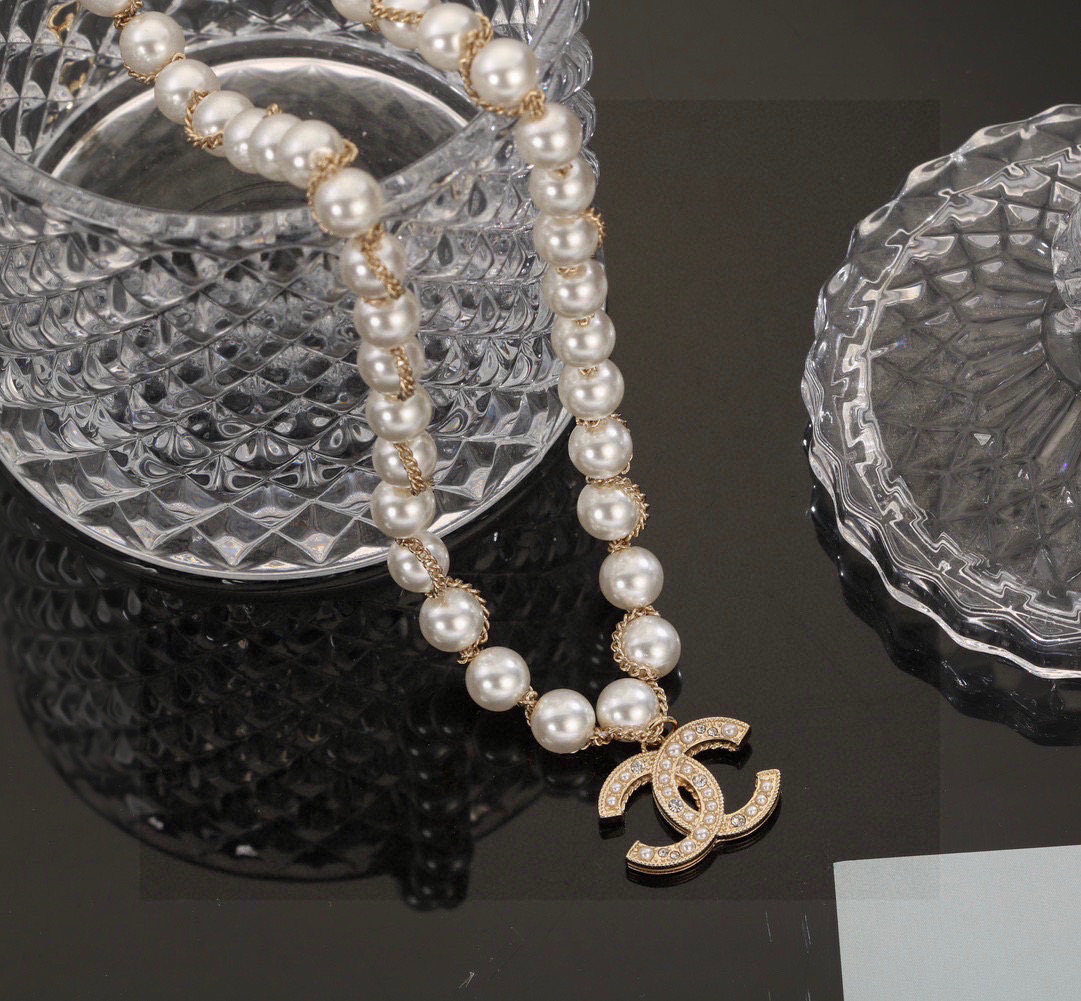 Chanel CC Logo Pearl Chain necklace gold-tone metal white faux pearl clear crystal 42cm