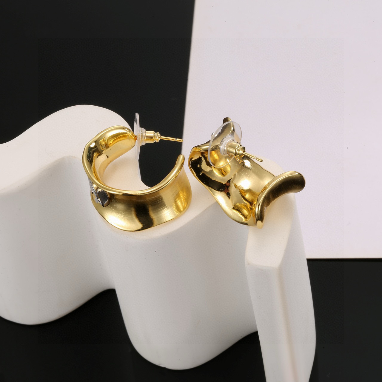 Saint Laurent Cassandre YSL Monogram Wavy Hoop earrings gold-tone metal with silver-tone YSL monogram 20mm hoop diameter