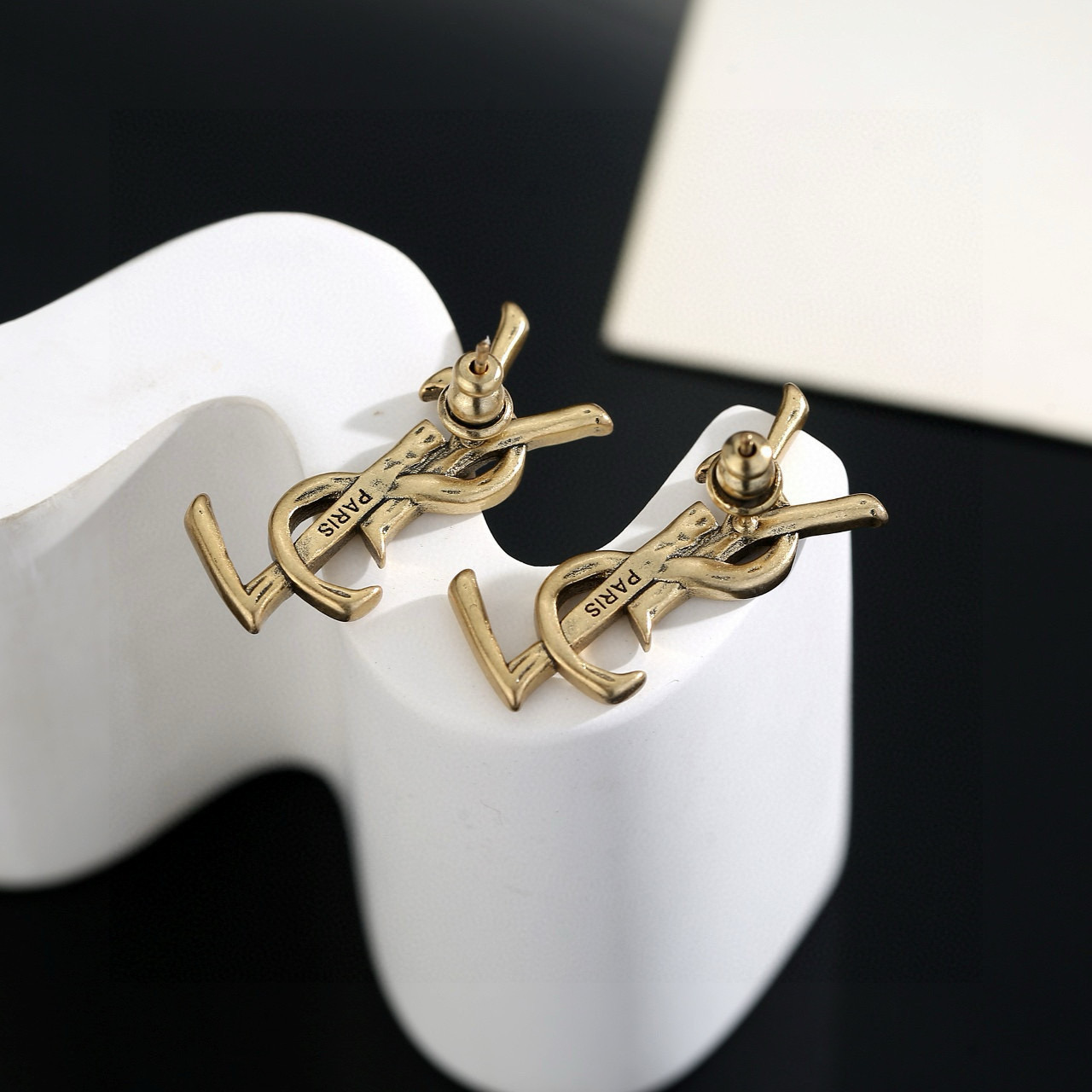 Saint Laurent Cassandre Monogram earrings antique gold tone metal 2 2cm length