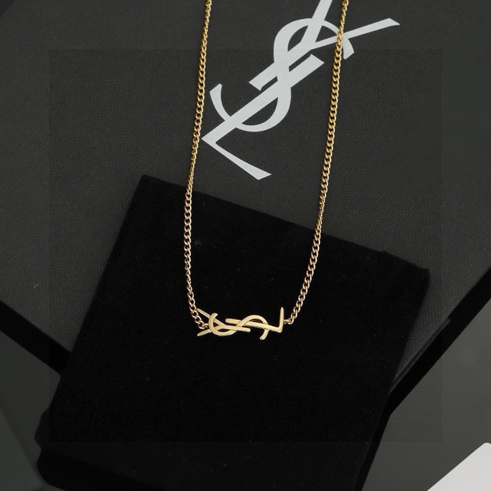 Saint Laurent Cassandre YSL Monogram necklace gold-tone metal no gemstones 45cm with 5cm extender